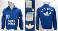 Original Trainingsjacke bzw. Aufwrmpullover des 1.FC Kln aus der Saison 1982/83 mit der Nummer "10" auf der Brust. Auf dem Rcken groes Adidas Logo und Schriftzug "1.FC Kln". Status:ABC.
