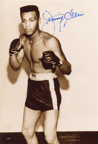 (1940-2014) Original signiertes S/W-Grofoto einer Boxpose vom Boxweltmeister im Schwergewicht 1968-70 der USA Jimmy Ellis. 21x16,5 cm.<br>-- Schtzpreis: 60,00  --
