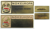 2x Teilnehmer-Abzeichen "N.O.K. Europa, 1946-1971". Ein Abzeichen mit eingravierter Name des Trgers "Walter Troeger". Bronze, vergoldet, mehrfarbig emailliert. 5.8x2.5 cm.<br>-- Schtzpreis: 120,00  --